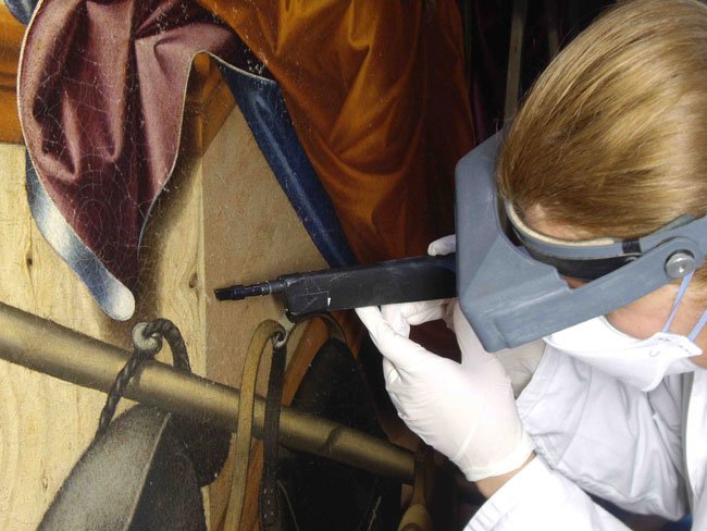 Conservator Claudia Vittori Removes Mold Growth from Carpaccio's Supper at Emmaus